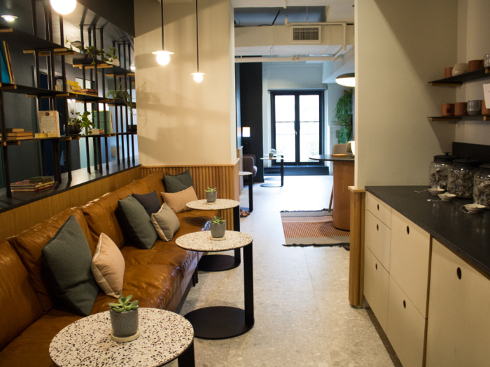 Walking in, the first thing you come across is a waiting area for clients. There are mugs for tea, couches, and bookshelves in this space. The couches were designed to face in the same direction to bypass any uncomfortable feelings patients might have encountering other people while waiting for their appointment to begin.