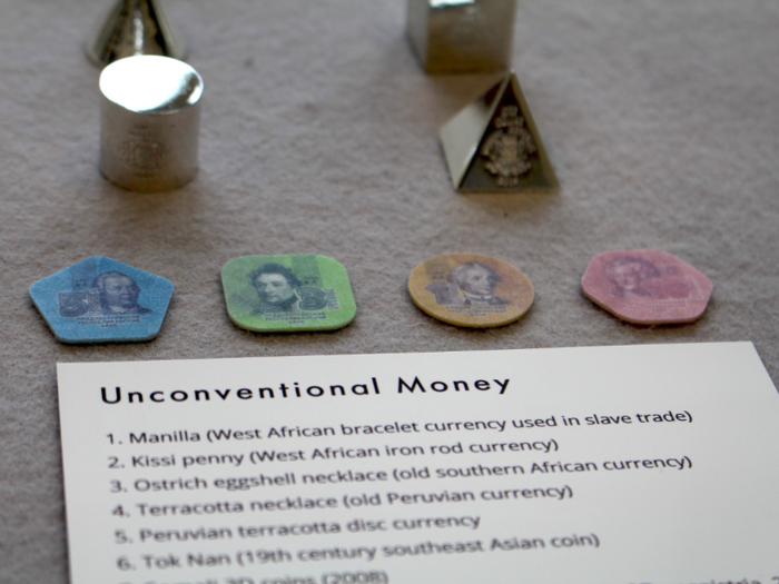 Alongside the charts, the chart room is filled with all sorts of interesting trinkets and historical items from the world of finance. This includes numerous esoteric forms of currency, including plastic coins and 3D metal coins from Somalia (both are pictured below)