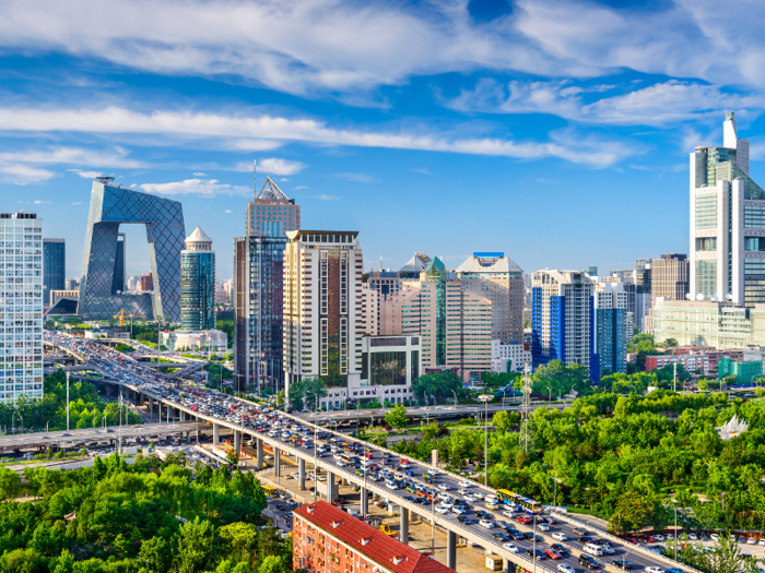 The traffic in Beijing is so congested, the government limits who can drive on certain days and regulates the law with designated license plates.