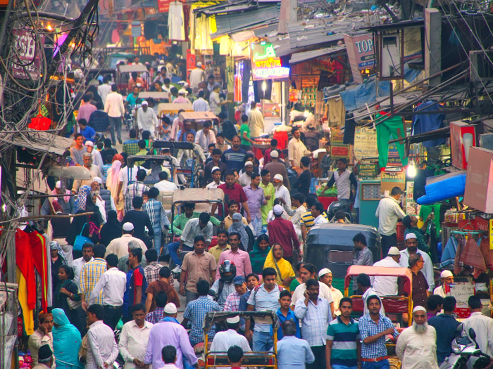 The main street in Old Delhi used to be a promenade for royals dating back to the 17th century. Today it is one of the most crowded marketplaces with wall-to-wall vendors selling everything from spices to wedding attire.