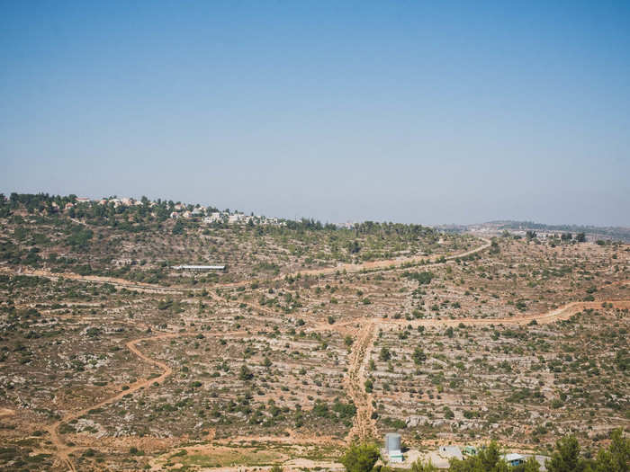 Masri had to also get Israeli approval for water and electricity to the city. The water became an issue that dragged on for years and nearly sunk the project. Much of the pushback came from the settler movement, where Israelis establish communities on lands within the Palestinian territories. The settlement of Ateret is basically next door to Rawabi.