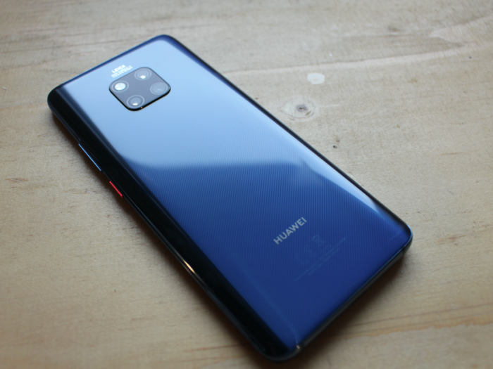 The phone feels good in the hand at 189g, with a glass back and slight texture that makes it a little less slippery. That massive quadrangle you see on the back is...