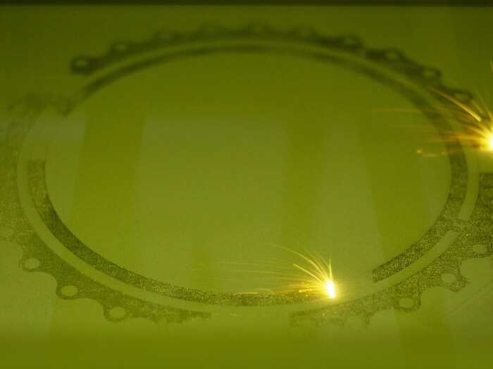 Over the course of days, lasers sinter the powder into shapes that