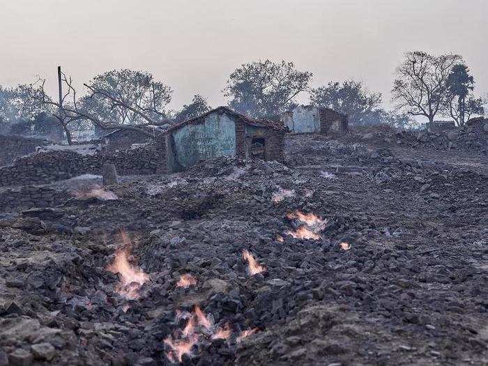 Coal fires have been burning in Jharia for over 100 years. Large-scale open pit mining was ramped up in the 1970s when coal companies were nationalized by the government. It has made the fires far worse.