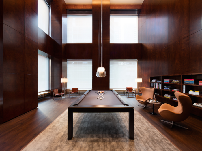 Other amenities at 432 Park include a billiards room and library ...