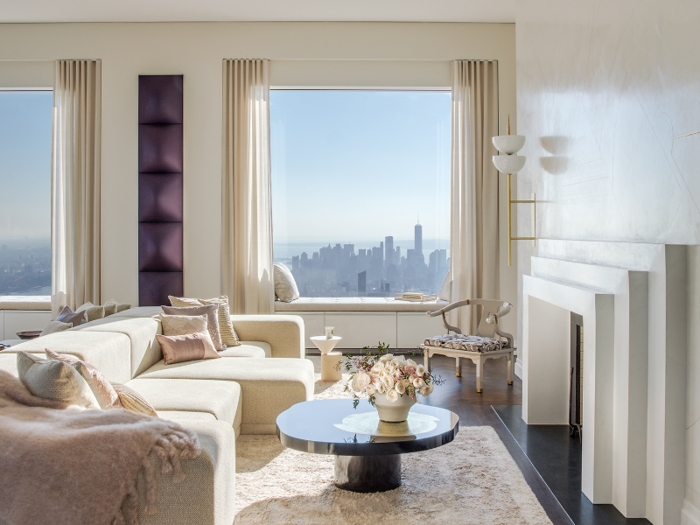 The unit, which is accessed by private elevator, offers panoramic views of the city and Central Park.