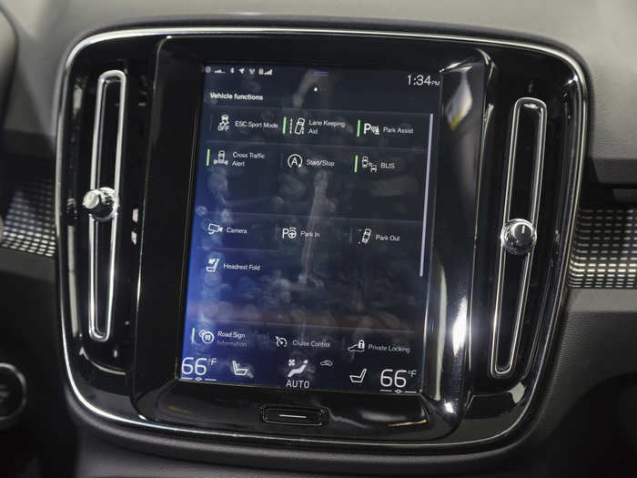 It consolidates nearly all vehicle functions into a tablet-like, swipe-able interface. It takes some getting used to, and it can be distracting. But it