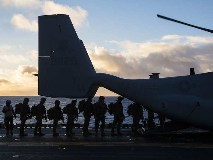 The 90 US Marines aboard the USS Iwo Jima were first loaded onto MV-22 Ospreys and CH-53 Sea Stallions.