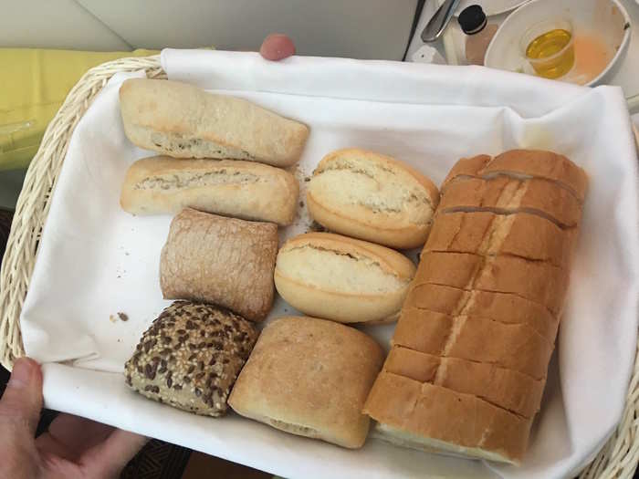 Soon after, the flight attendants provided breads to choose from, including ciabatta, malted grain, sourdough, and garlic bread.