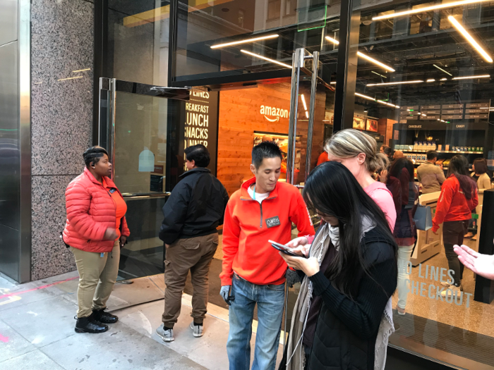 Before entering the store, customers were prompted to download the Amazon Go app, which created some congestion and confusion outside.