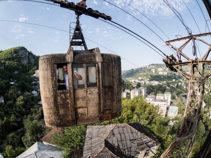 In Georgia, cable cars in Chiatura take people to and from work, hovering hundreds of feet above the ground.