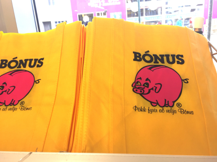 She even picked up a few Bónus shopping bags — which display the brand