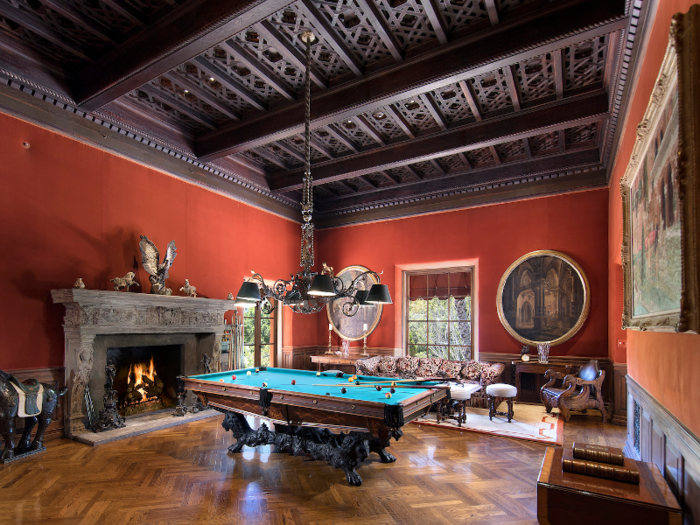 The 32-foot billiards room is open to the main hallway.