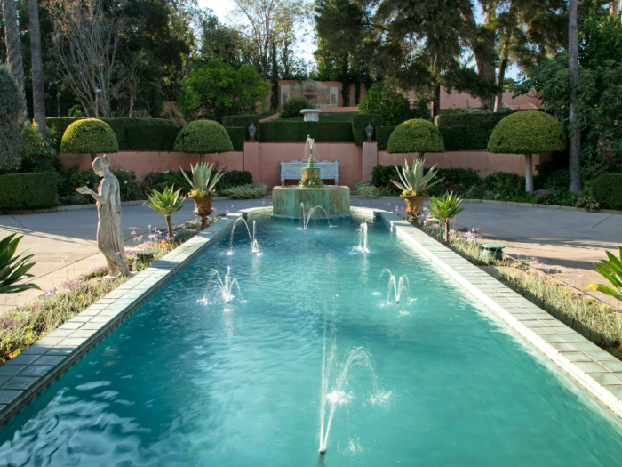 There are two swimming pools on the property, along with what appears to be several water features.