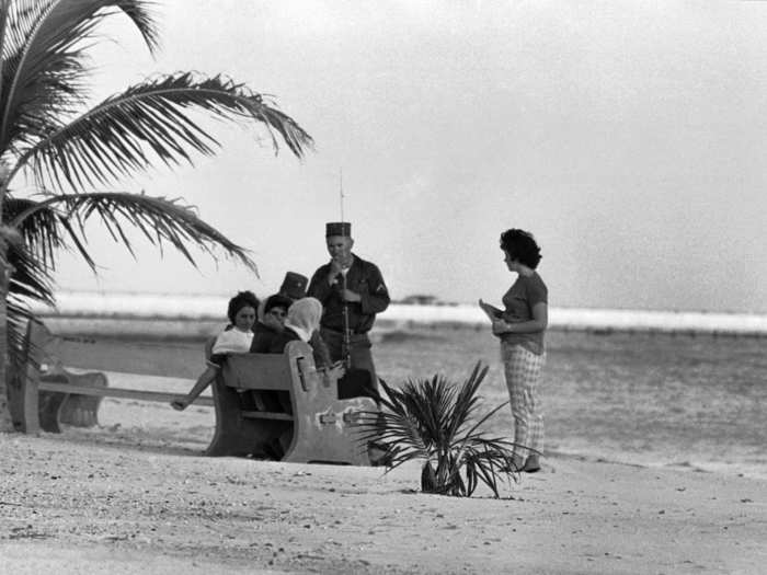 Soldiers on their first day off-duty since their arrival seem to be enjoying themselves, fish or no fish, in Key West, Florida, November 4, 1962.