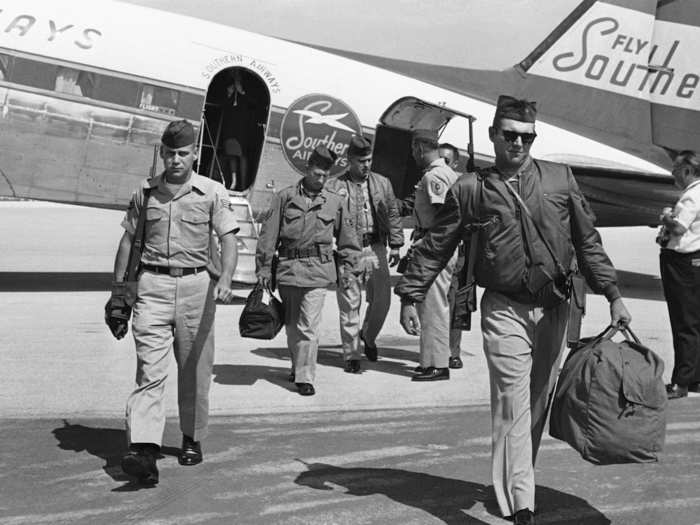 Members of a 14-man detachment of air police exit a Southern Airways plane at the Key West International Airport, October 24, 1962. The detachment was from Seymour Johnson Air Force Base near Goldsboro, North Carolina.