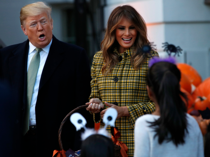 Donald and Melania Trump handed out candy to children on the South Lawn.