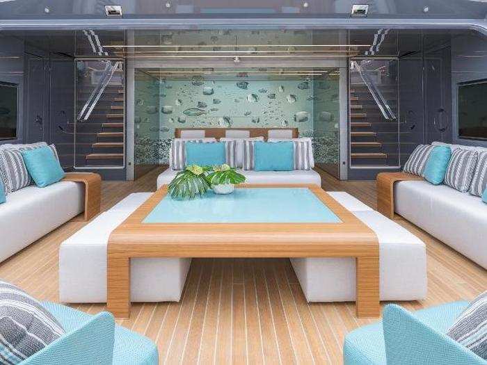 On the deck, the yacht has a 70-square meter beach club that opens directly out to the ocean at sea level.