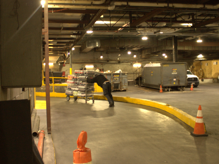 By 11 a.m. they were pushing the super-heavy carts up a ramp and into a freight elevator that took us into the underbelly of Penn Station.