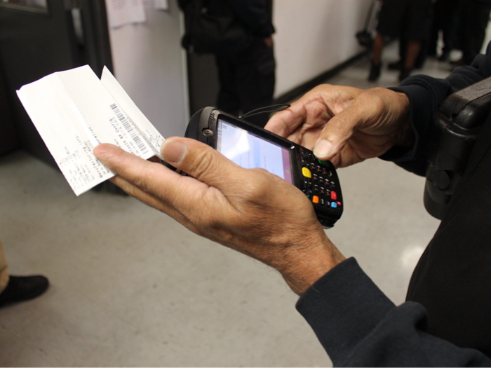 At 5 a.m., Santiago and his fellow drivers went inside the Liberty building to receive their routes.