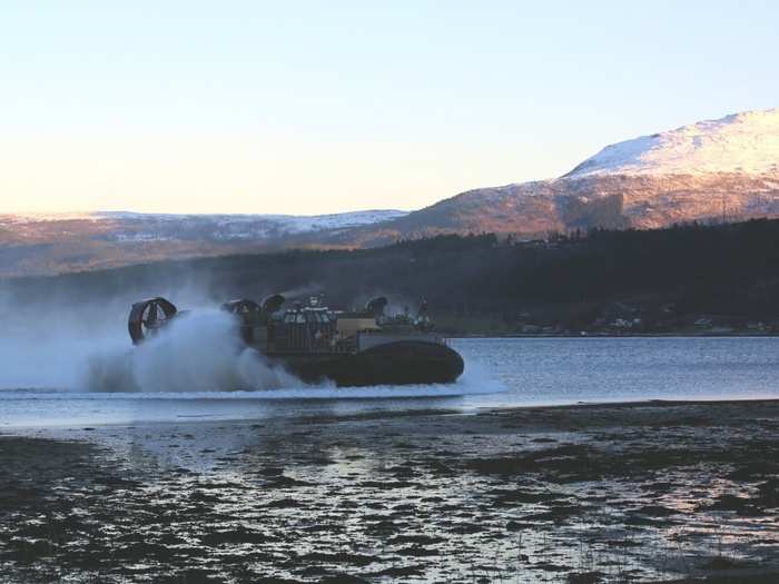 U.S. Marines and sailors with 24th Marine Expeditionary Unit conduct an amphibious landing on a Landing Craft Air Cushion in Alvund, Norway, Oct. 29, 2018.