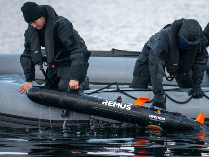 Dutch Navy REMUS (Remote Environmental Monitoring Units) Team recovers the Autonomous Underwater Vehicle while performing a bottom of the sea reconnaissance prior amphibious maneuvers during Trident Juncture 18.