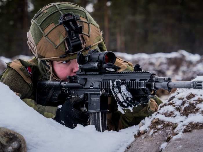 A Norwegian soldier takes aim near Røros, Norway during Trident Juncture 18.