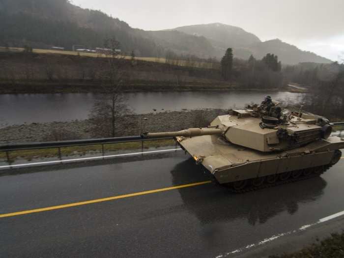 U.S. Marines from 2nd Tank Battalion, 2nd Marine Division, push towards their objective in a M1A1 Abrams tank during the Combat Enhancement Training/Force Integration Training phase of Exercise Trident Juncture 18 near Storås, Norway, Oct. 26, 2018.