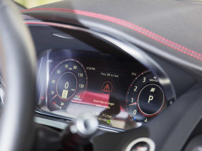 The instrument cluster is digital, but with analog gauges.