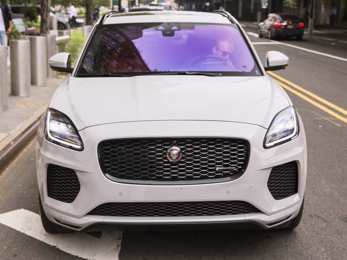 Stashed under the hood, behind the blacked-out grille and the crimson-and-chrome Jaguar badge is 296-horsepower, turbocharged 2.0-liter four-cylinder engine, making 295 pound-feet of torque. There