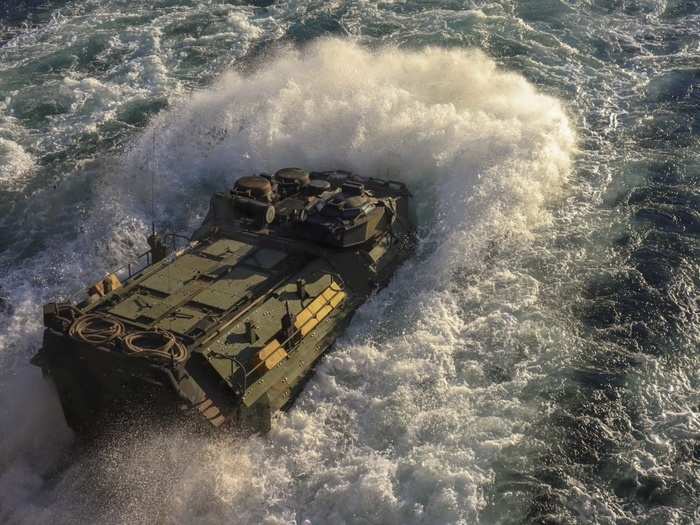 An amphibious assault vehicle assigned to the 24th Marine Expeditionary Unit sets out from the USS New York.