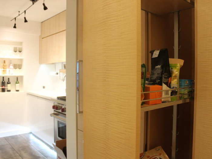 This $1.29 million Midtown apartment is starved for storage, but it includes a number of crafty design elements, like a hidden pantry.