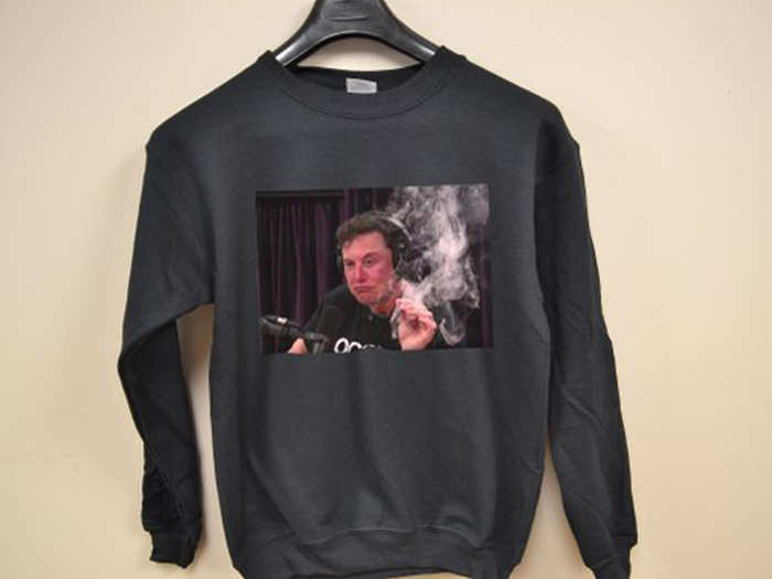A sweatshirt of Elon Musk smoking on the Joe Rogan podcast