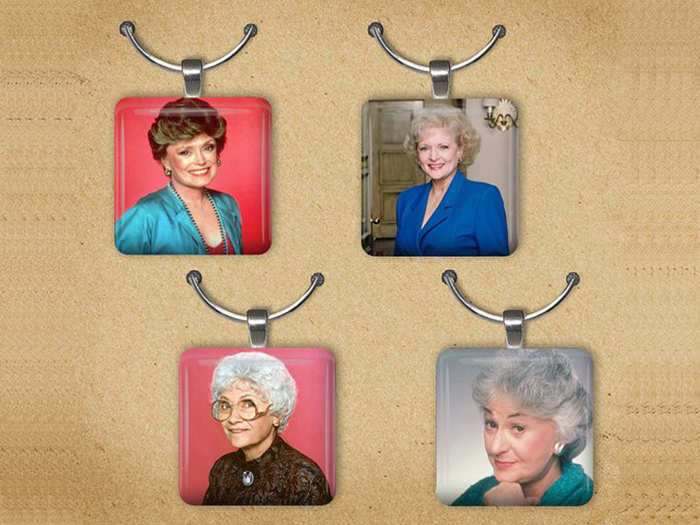 A set of Golden Girls wine charms