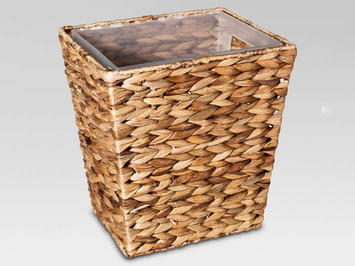 A woven wastebasket for the bathroom or bedroom