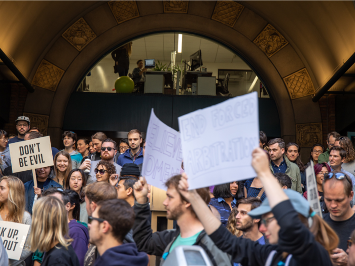 What appeared to be hundreds of workers flooded the sidewalks outside the Google office.