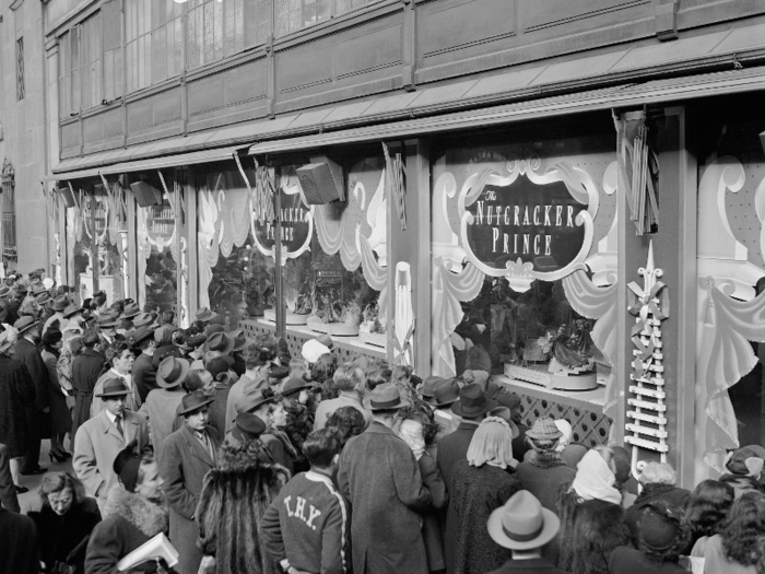 Window displays became more extravagant through the years. This photo from 1946 shows shoppers gathered around a "Nutcracker Prince"-themed display window.