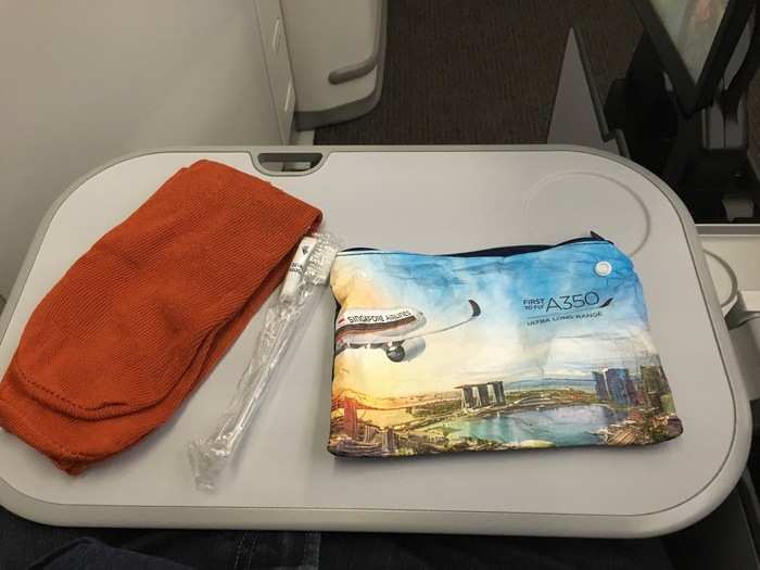 All passengers are provided with a pillow and blankets along with socks and toiletries.