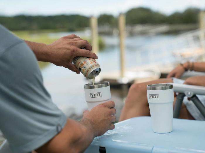 A pair of durable stainless steel pint glasses that keep drinks cold for hours