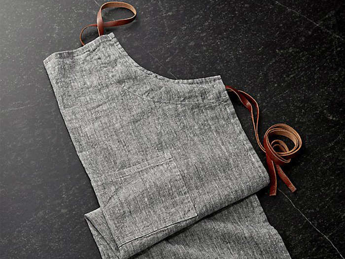 A chambray and leather apron