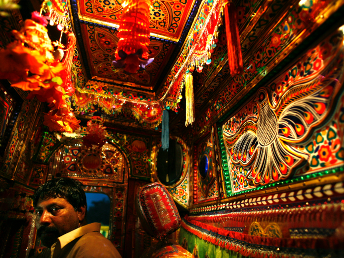 This is Bashir, who has been a truck driver for 25 years. Elaborately decorated trucks like his became the norm in Pakistan after the country split from India in 1947; Pakistanis wanted to make their trucks look different.