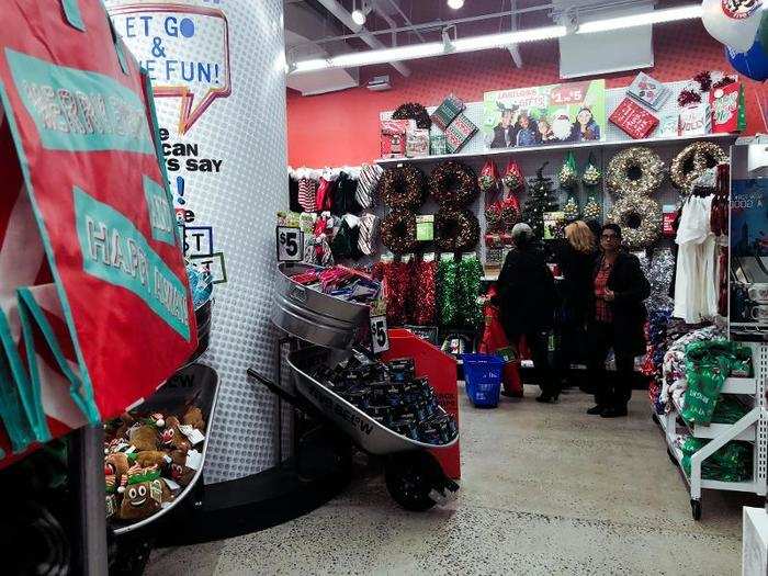 At the bottom of the escalator was a small section of New York City souvenirs and a ton of Christmas decor. Christmas music was playing over the speakers.