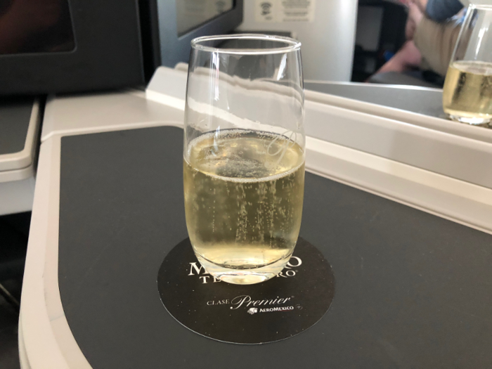 We were offered a choice of drinks when we sat down as boarding continued — we went for the sparkling wine…