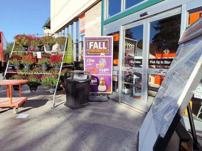 Outside of the store were seasonal plants and products like pumpkins and scarecrows.