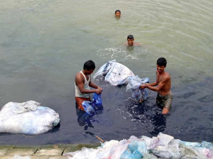 Some people swim in the river ...