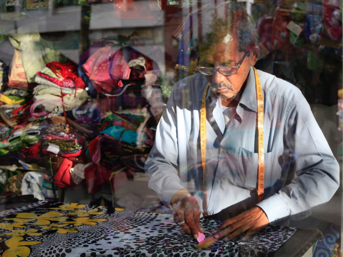 Many people in Dhaka work in the booming garment industry.