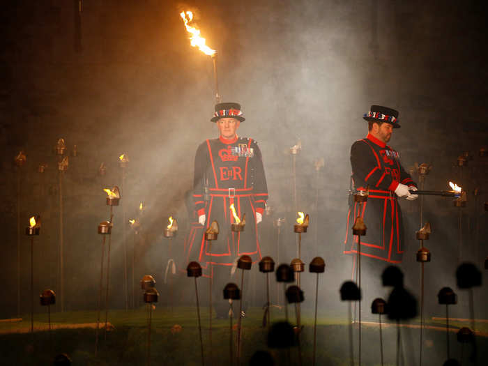 From there, a Yeoman Warder brought a flame down from the tower to the moat in order to light the approximately 10,000 torches.