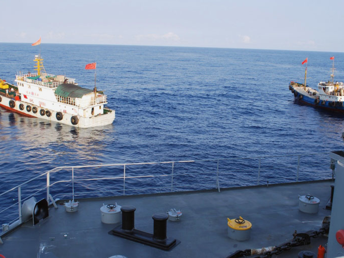 Five Chinese vessels harass a US Navy surveillance ship in the South China Sea on March 8, 2009.