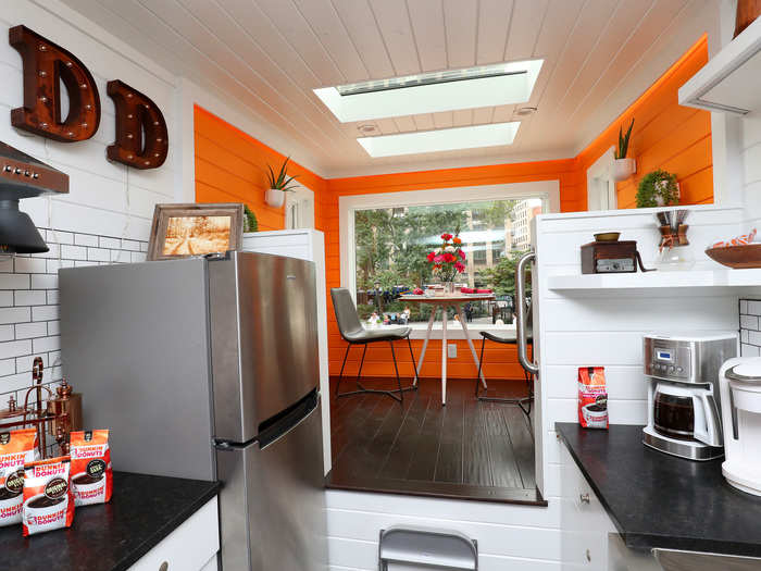 The design was executed by New Frontier Tiny Homes, who wanted the exterior to mimic the color of coffee.