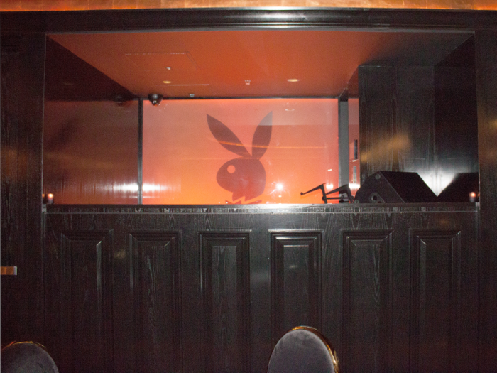 The iconic bunny logo looms from behind the bar